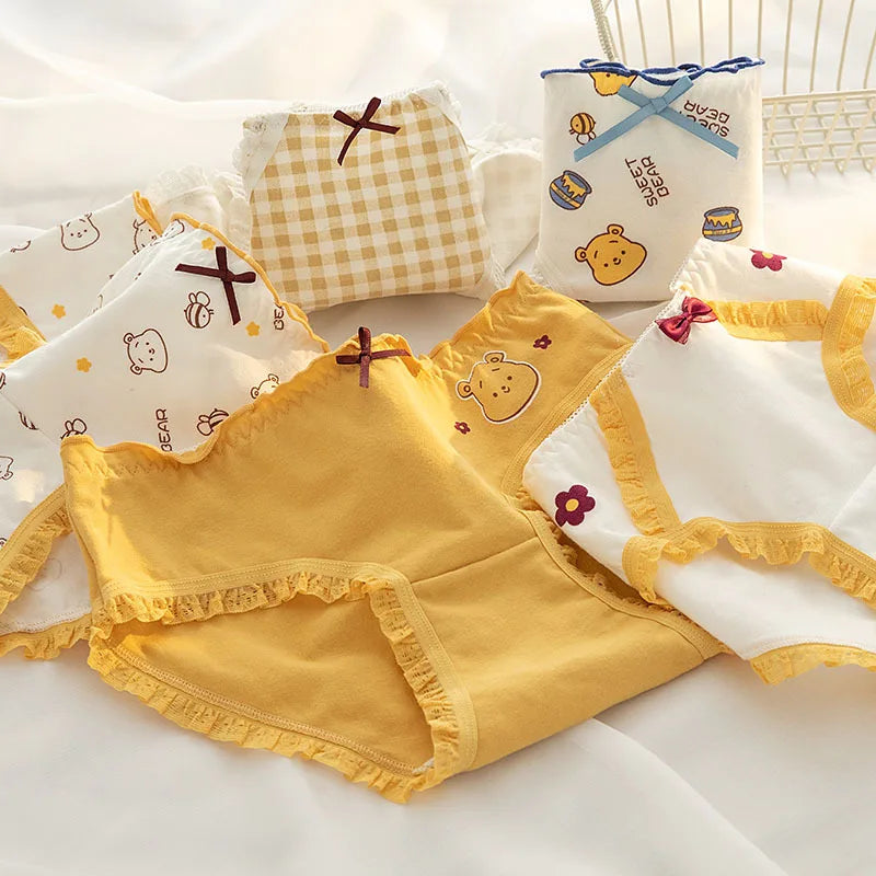 White and Yellow panties with stylish prints, offering essential comfort and casual wear.