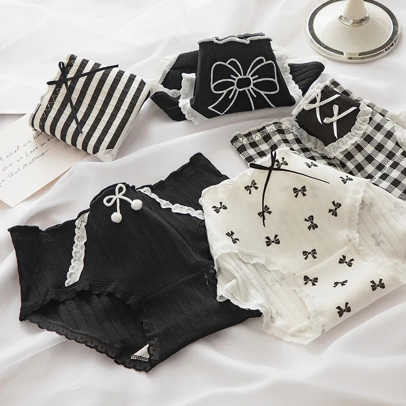 Family Christmas gift pajamas set in various colors, featuring Essential Panties and stylish designs.