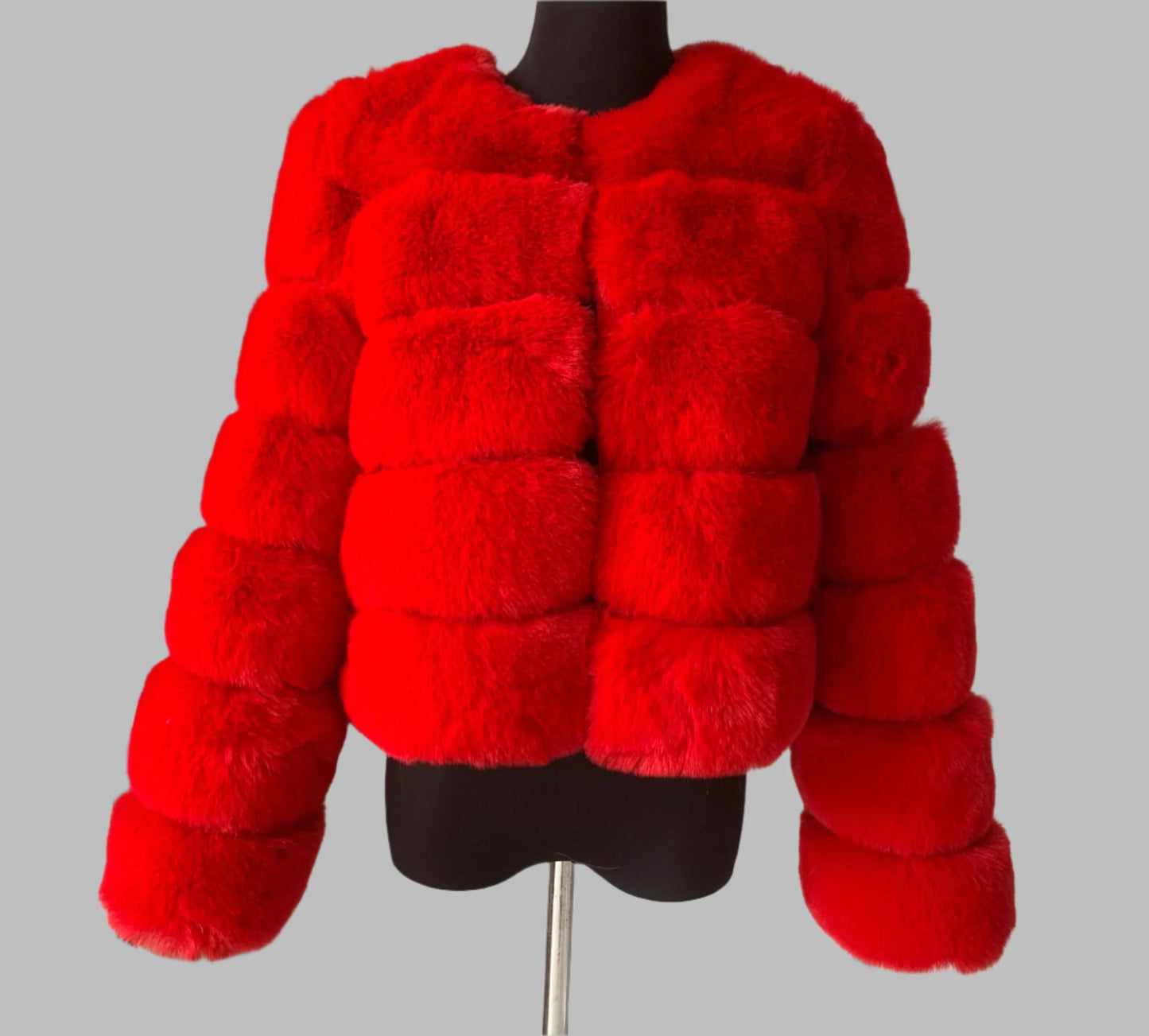 "Introducing the Amoura Elegance women's full sleeve faux fur coat in a striking red hue, perfect for adding a pop of color to your autumn and winter wardrobe. This luxurious 60 cm jacket features plush faux fox fur with stylish full sleeves, ensuring both warmth and elegance. Available in sizes up to 7XL, it combines comfort and fashion for the modern woman."