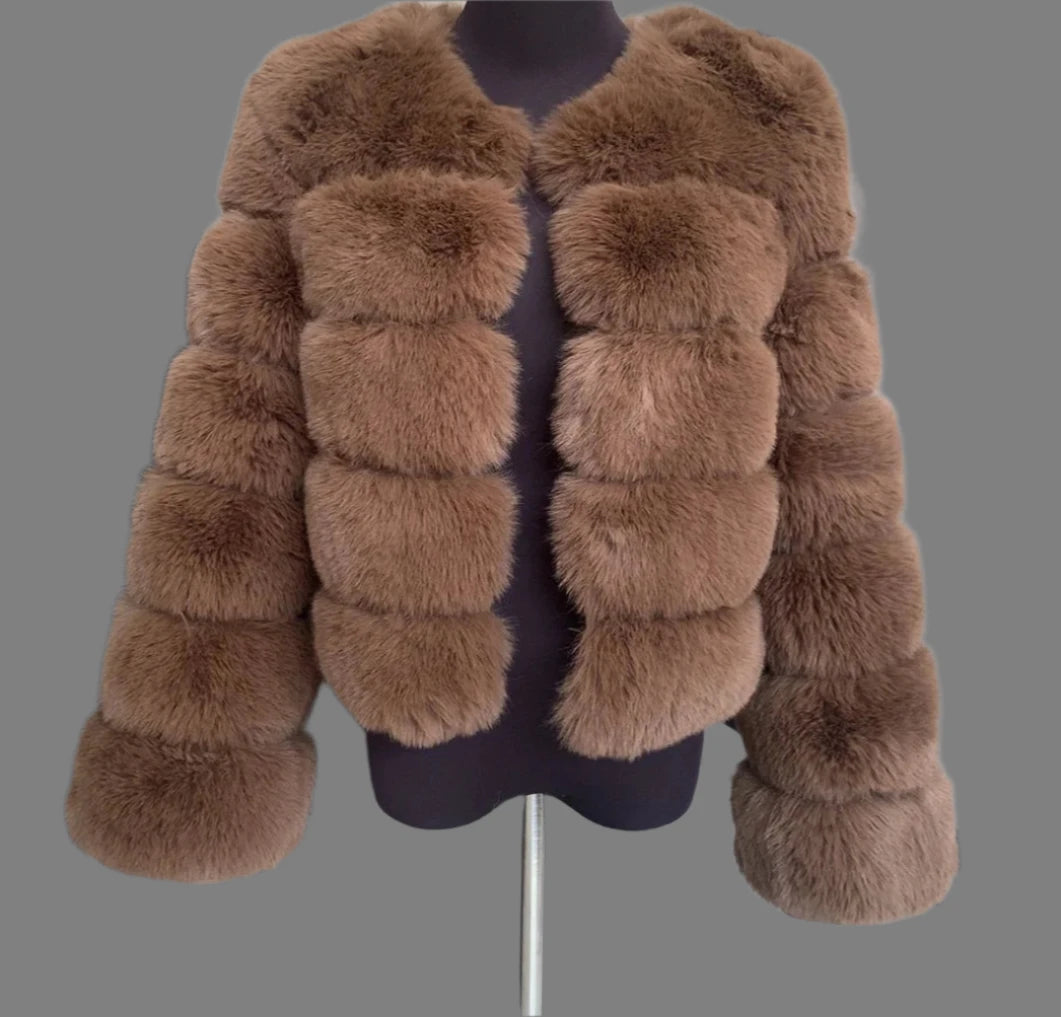"Amoura Elegance women’s short faux fur coat in rich chocolate brown, crafted from luxurious fluffy faux fox fur, featuring full sleeves and a chic 60 cm length, available in size XXXXL."