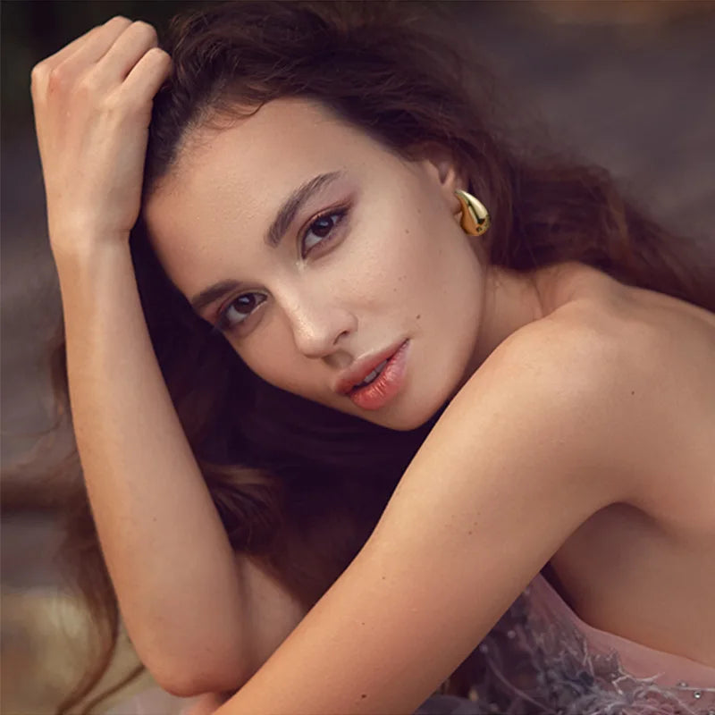 "AmouraElegance Irregular Metal Water Droplets Earrings | European & American Style Personalized Fashion Stud Earrings for Girls | Travel Accessories"