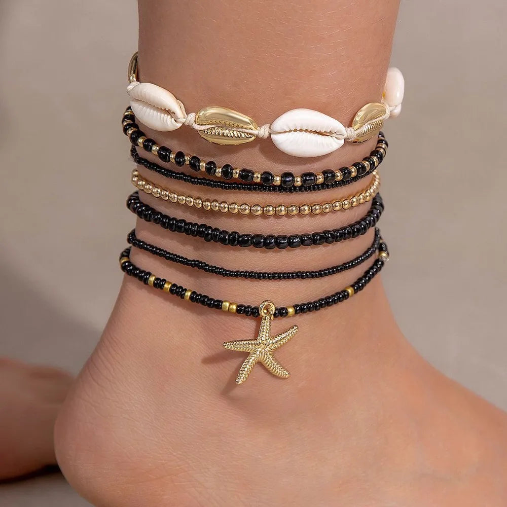 "AmouraElegance 7Pcs Bohemian Beach Rice Beads Elastic Anklet Set | Charm Alloy Anklets with Stretch Holiday Starfish & Multi-layer Design"