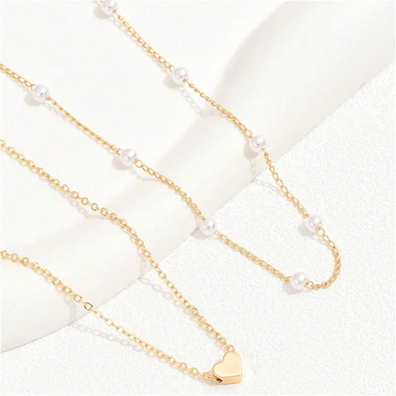 "AmouraElegance Simple Pearl Choker Necklace for Women | Fashion Double Layer Chain with Small Love Heart Pendant | Wholesale Jewelry Gift"