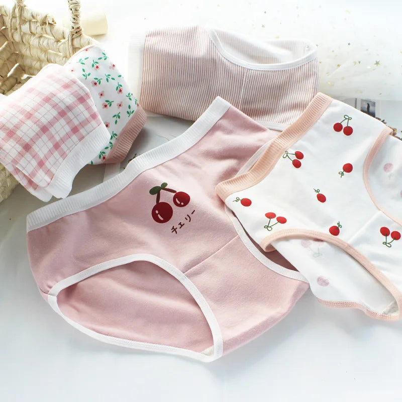 Family Christmas gift pajamas set in various colors, featuring Essential Panties and stylish designs.

