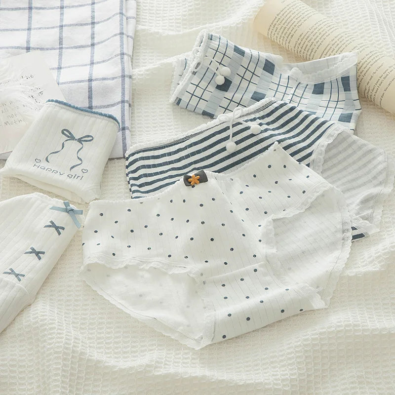 Family Christmas gift pajamas set in various colors, featuring Essential Panties and stylish designs.
