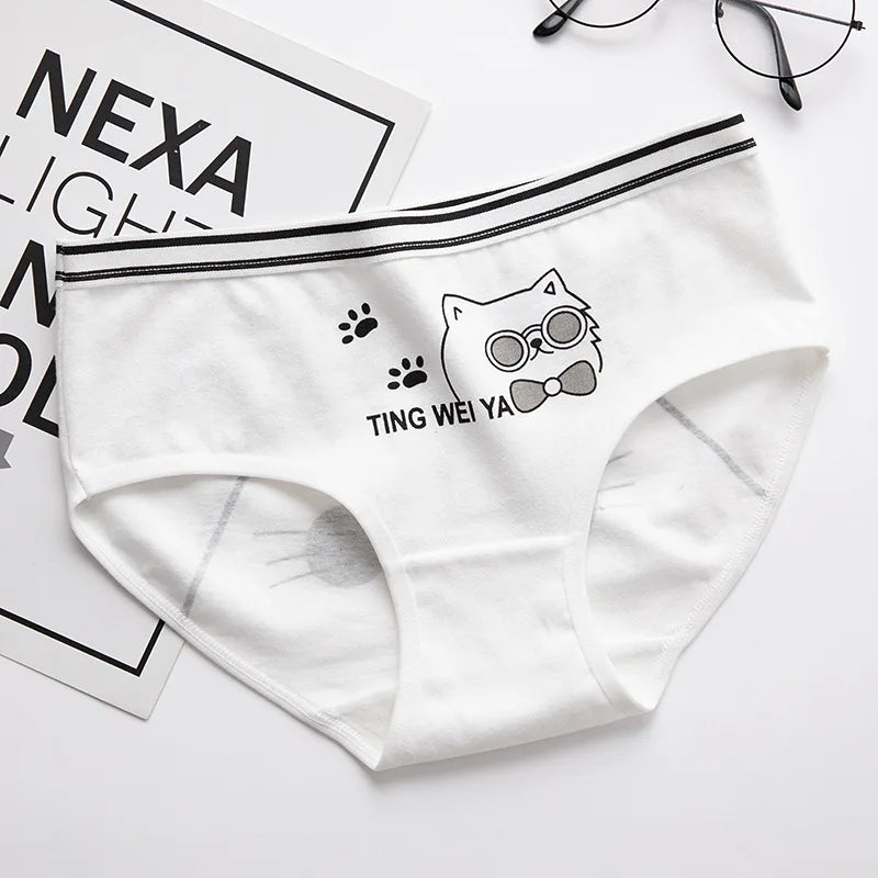 "Women's white cartoon cat design knickers, made from breathable fabric for all-day comfort."