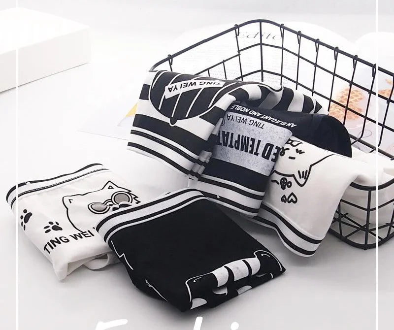 "Black and White women’s knickers pack of 5 with a star cartoon design, providing comfort with a touch of fun."
