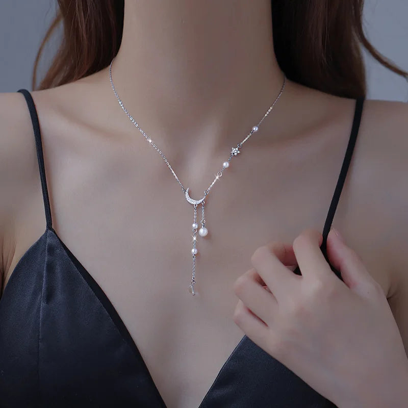 "Amoura Elegance Star Moon Imitation Pearl Tassel Chain Necklace – Light Luxury Clavicle Chain for Women, Party Jewelry"