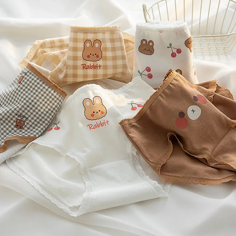 Brown and white ladies' panties set with charming prints, offering everyday comfort and style from Amoura Elegance.