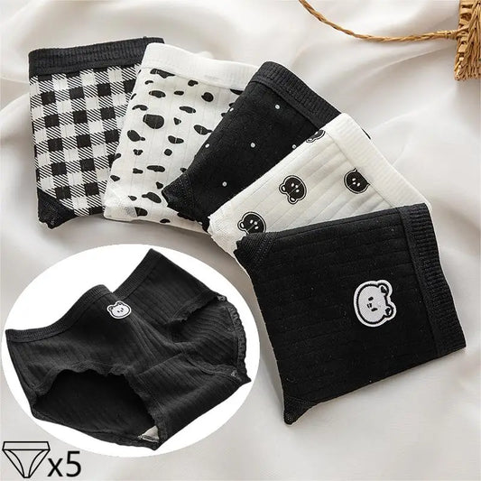 White and black panties with various prints, part of Amoura Elegance’s comfortable and fashionable women’s underwear collection.